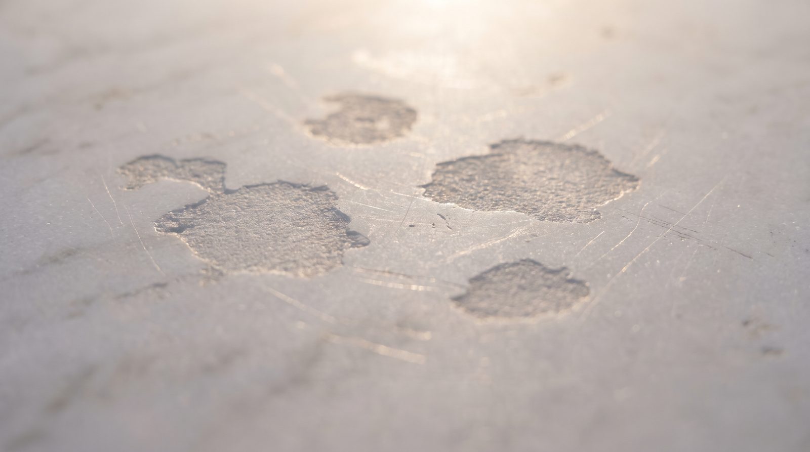 close-up of acid etch marks on polished marble